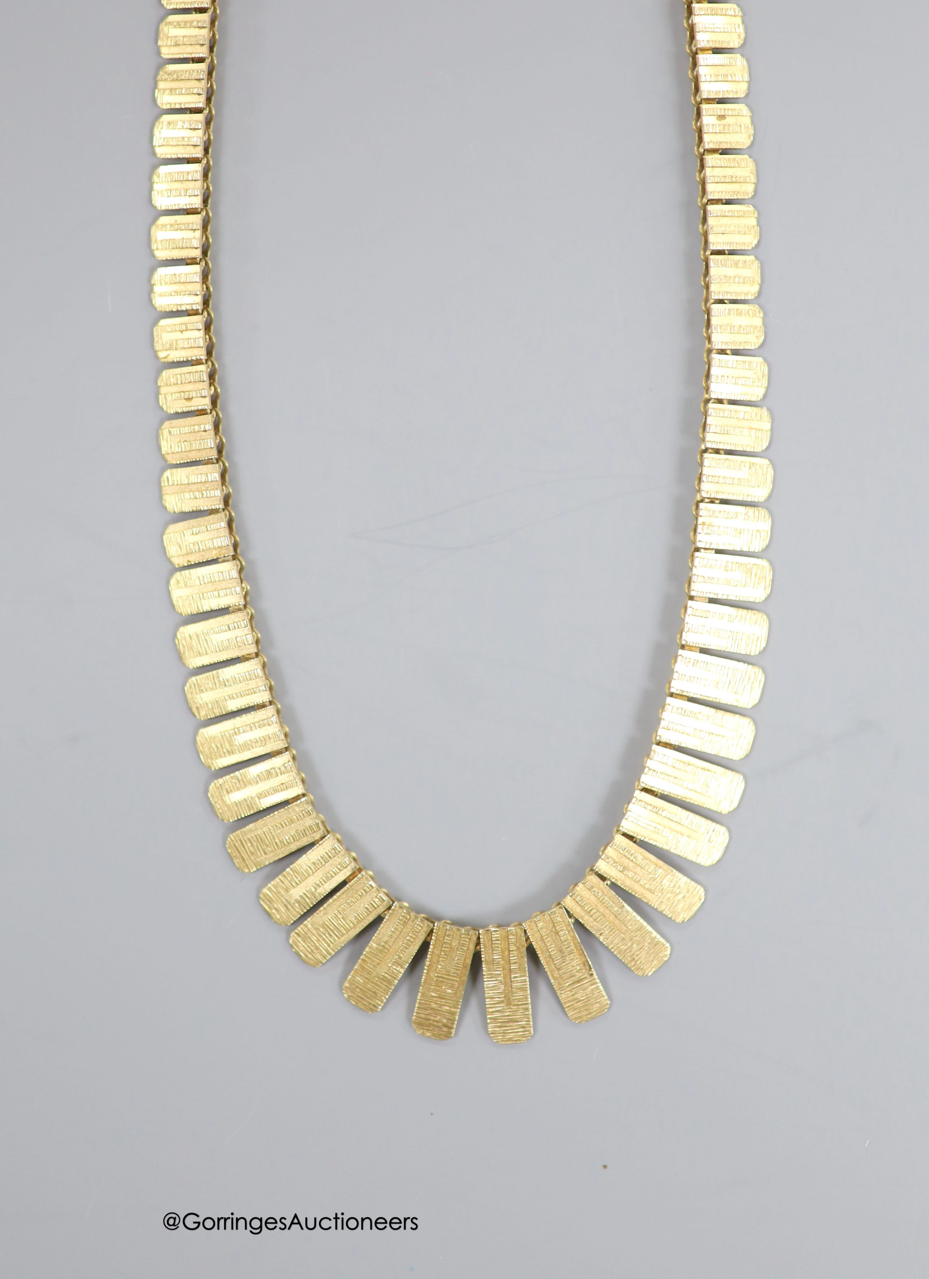 A modern 9ct gold fringe necklace, 42cm, 19.3 grams.